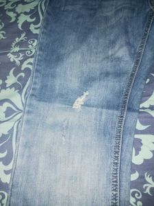 Distressed Denim Jeans