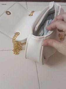 Brand New small sling with gold slin