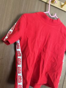 Red Top With Levis Strip At The Sides Turtle Neck