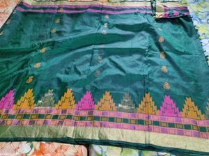 Green kanchipuram silk saree.