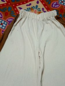 Flared Lower With Side Cuts.