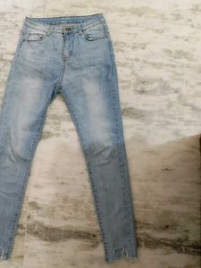 Light Wash Distressed Hem Jeans