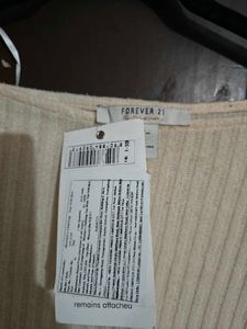 Ribbed Knit sweater tag