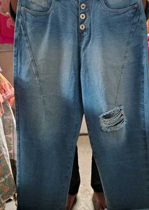 Ripped Blue Denim Jeans with tag