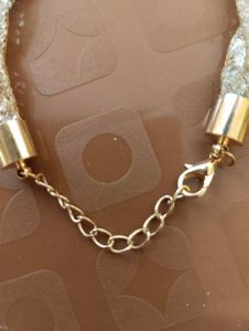 Golden Bracelet With Shimmering Diamonds Accents