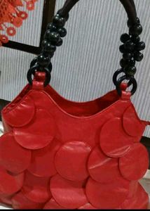 Red Handbag with Unique Design