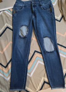 Ripped Knee Jeans