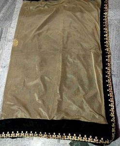 Beautiful Black And Cream Colour Georgette Saree