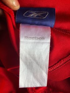 Show your Reds pride with the official Reebok
