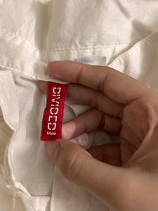 H&amp;M Sleeveless Button Down Shirt