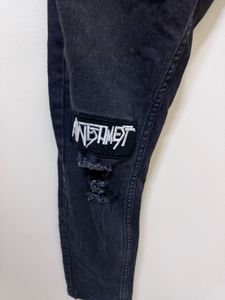 Distressed black jeans