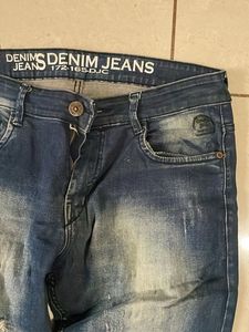 Distressed Denim Jeans