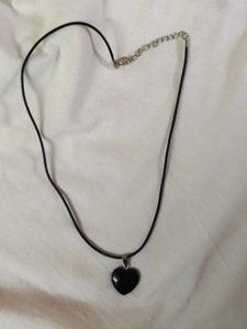 Black Heard Shaped Pendant And Faux Leather Chair