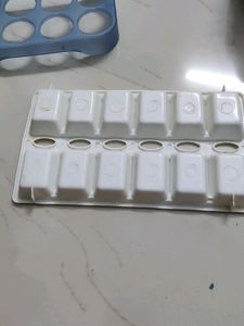 Ice cube maker and egg setter