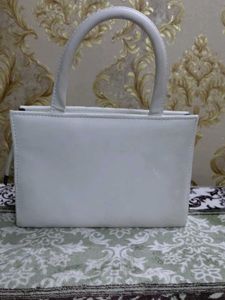 White Handbag with Unique Detail