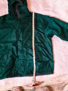 Green hooded windbreaker