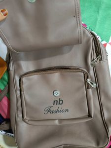 Slightly Used Bagpack With 4 Chain Pockets