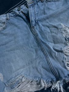 blue ripped skirt