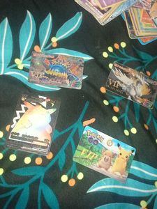 3 POKEMON VIP CARDS WITH ONE EXTRA RAINBOW PIKACHU