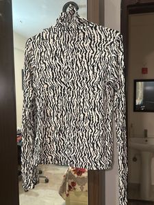 Zebra Print Turtleneck Top