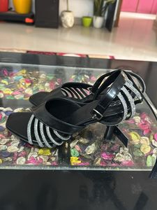 Love in black shimmer strap heels