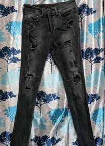 Distressed Black Skinny Jeans