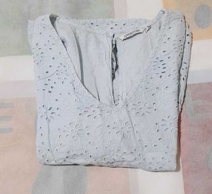 Eyelet Peplum Top