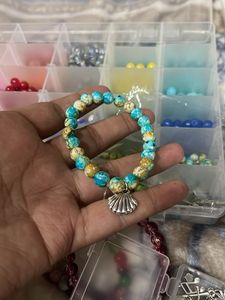 blue Beaded Bracelet with Shell Charm