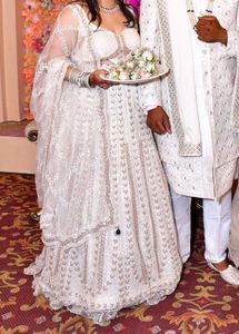 Heavy Lehnga With Backless Blouse And Dupatta.