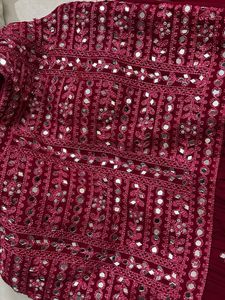 Red Mirror work lehanga with flared bottom and net