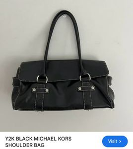 Elegant Black Handbag Similar To Michael Kors.
