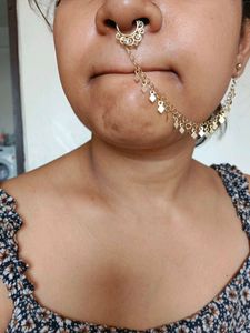 3 Pairs Of Earrings And A Nose Ring Like Noth.