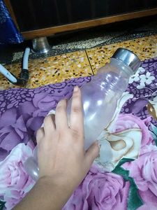 TRANSPARENT BOTTLE WITH STEEL CAP