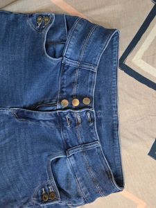 Ripped Knee Jeans