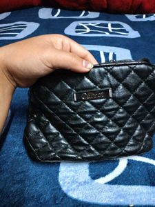 Black Quilted Carrot Sling Bag