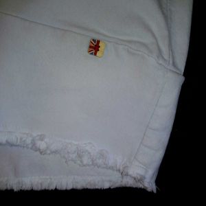 High-Waist White Stretchable Jeggings with Raw Hem