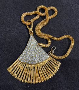 Golden Coloured Pendant With Chain