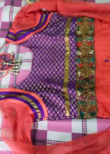 A Beautiful Shining Cloth Gajri Colour Frok Suit With Dupatta And Pajami For Size 36. A Second Hand Item But Purchasable No Damages