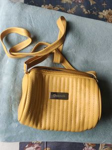 Stylish Mustard Circular Sides Sling Bag