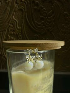 Pearl Drop Earrings with Bow Detail