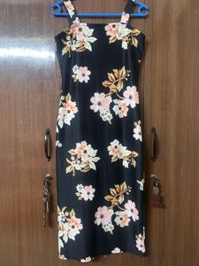 A Black Dress With Floral Print