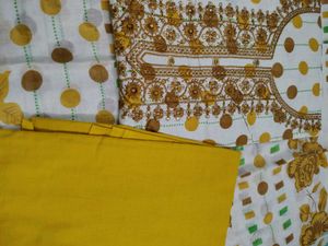 Elegant yellow unstichted suit with printed cotton