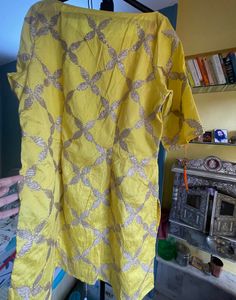 Pretty yellow designer top