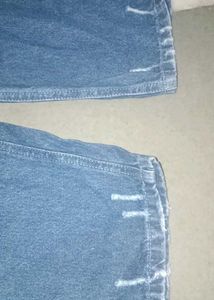 Distressed Blue Denim Jeans