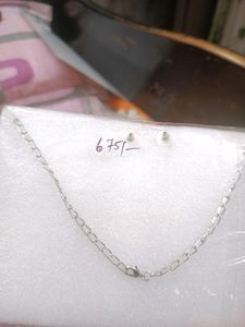 Silver Color Necklace With Imbeded Red Stone