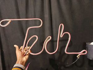 Pink Neon Word Sign 'tech'