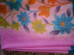 Chiffon Saree With Multicolour Flower Design.