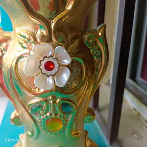 Vintage Gold Vase with Floral Detail