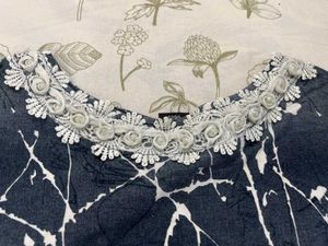 A Very Beautiful Top With Flower Detailing