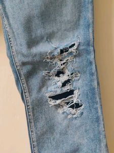 Ripped Blue Denim Jeans